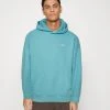 Levi's® Gold Tab Hoodie Unisex - Hoodie - Pastel Turquoise -Gant shop 034c6b73cfff49819a0e6272fa412f3a
