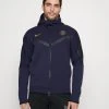 Nike Performance Paris St Germain Tech Hoodie - Sweatjakke - Blackened Blue/Gold Suede -Gant shop 2fcf122f799544fb8722ad1b5a55bf5a