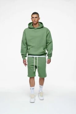 Alternative view of Pegador Logo Oversized Hoodie Unisex - Sweatshirt - Vinatge Washed Cypress Gum