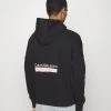 Calvin Klein Jeans Layered Address Hoodie - Sweatshirt - Black 1 Calvin Klein Jeans Layered Address Hoodie - Sweatshirt - Black -Gant shop 64b32040d0424ef6989c13a32a515f92