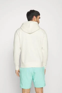 BJØRN BORG Essential Hoodie - Hoodie - Cannoli Cream -Gant shop 660ba7bdb4484543a403045213356ecd scaled