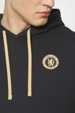 Nike Performance Chelsea London Club Hoodie - Klubbklær - Pitch Blue/Club Gold -Gant shop 6f54016dfb0d4674b39cac46da8e1fc3 scaled