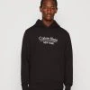 Calvin Klein New York Logo Hoodie - Hoodie - Black -Gant shop 80f40afd4d9e4c5e95d1a3d3d9c948b6