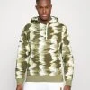 Nike Performance Heritage Hoodie - Hoodie - Medium Olive -Gant shop 897c9fdc485d4dd2a4c5cddcb6b84cd3