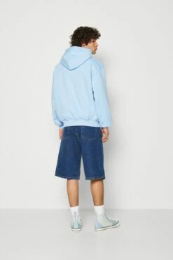 Karl Kani Small Signature Hoodie Unisex - Sweatshirt - Blue -Gant shop 916fe24f10494e52a3b2919a2a091cea scaled