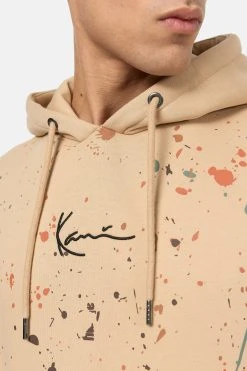Karl Kani Small Signature Paintsplatter Hoodie - Hoodie - Sand -Gant shop a1d509f990244abb969c8cfce3e7b8d2 scaled