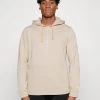 Puma Studio - Hoodie - Granola -Gant shop b0c5c375bdb6427180f64c1bd957315d