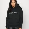 Calvin Klein Inclusive Core Logo Hoodie - Sweatshirt - Black 1 Calvin Klein Inclusive Core Logo Hoodie - Sweatshirt - Black -Gant shop b75fa398a5714ed7875952eb4d65fc94