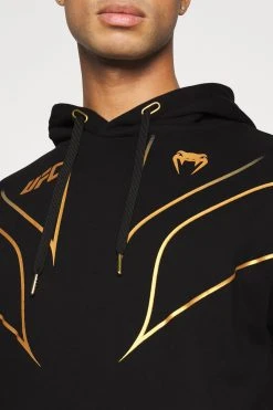 Venum Ufc Fight Night 2.0 Replica Mens Hoodie - Hoodie - Black/Gold -Gant shop c4c8b1e9153d4ec5a30ed2cfb13a9629 scaled