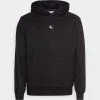 Calvin Klein Jeans Micro Monologo Hoodie Unisex - Hoodie - Black -Gant shop de1910ad50d14f358987ed6e53dab2b6