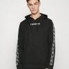 Reebok Ri Vector Tape Oth- Hoodie - Black -Gant shop e65271f179b24210ba8a97454ab1dac9