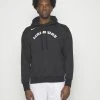 Nike Performance City Edition Essential Hoodie - Hoodie - Black -Gant shop eb0b7bf26dbc460f99a08c6d9d1db874