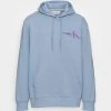 Calvin Klein Jeans Glitched Monologo Back Hoodie Unisex - Hoodie - Iceland Blue -Gant shop ecd805ca9d7741d5a568e1275e697770